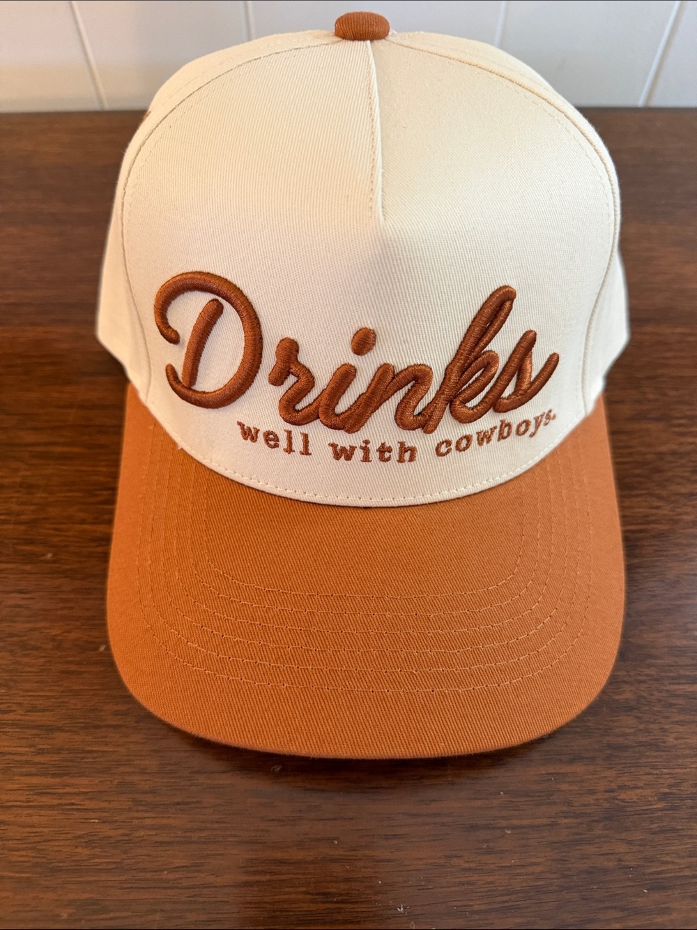 Drinks Well With Cowboys Two-Tone Trucker Hat - Cream & Rust